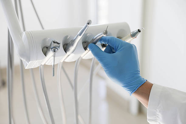Professional Wisdom Tooth Removal technician working in Garden City, MI